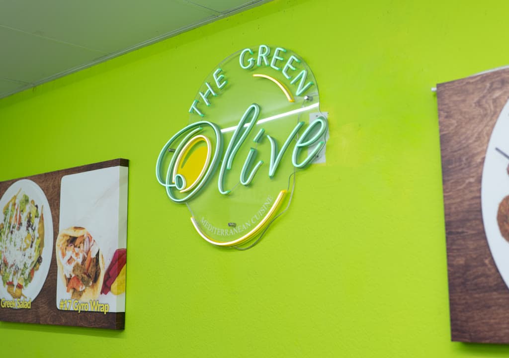 The green feature wall at The Green Olive
